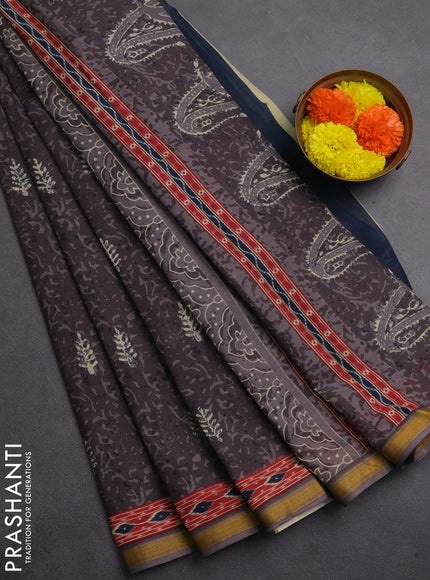 Muslin cotton saree dark grey with allover dabu prints and printed border