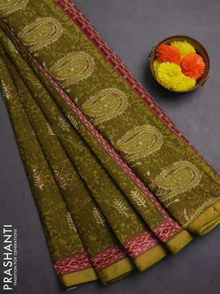 Muslin cotton saree mehendi green with allover dabu prints and printed border