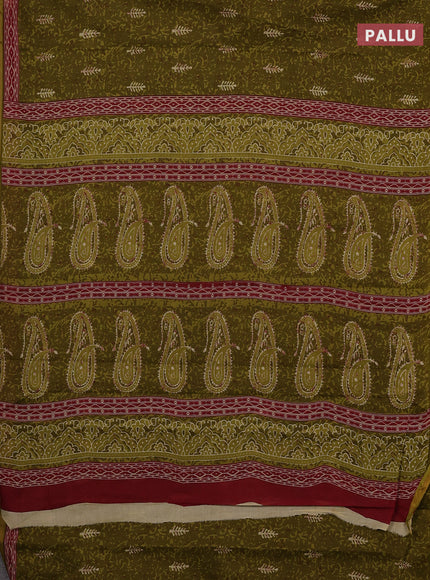 Muslin cotton saree mehendi green with allover dabu prints and printed border