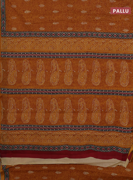 Muslin cotton saree mustard yellow with allover dabu prints and printed border