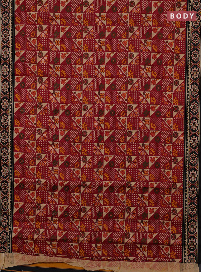 Muslin cotton saree maroon and black with allover patola prints and printed border