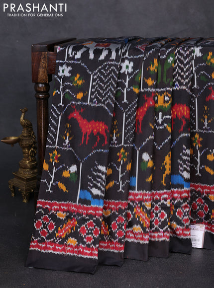 Pochampally silk saree black with allover ikat weaves and ikat woven border