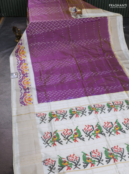 Pochampally silk saree dual shade of purple and cream with allover ikat weaves and long zari woven ikat border