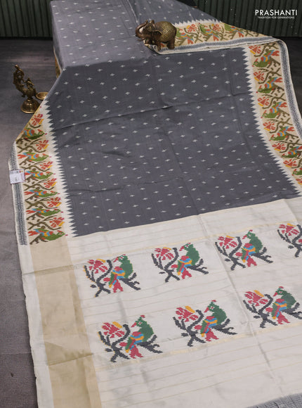 Pochampally silk saree grey and cream with allover ikat woven buttas and temple design ikat zari woven border