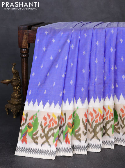 Pochampally silk saree blue and cream with allover ikat woven buttas and temple design ikat zari woven border