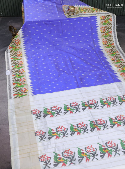 Pochampally silk saree blue and cream with allover ikat woven buttas and temple design ikat zari woven border