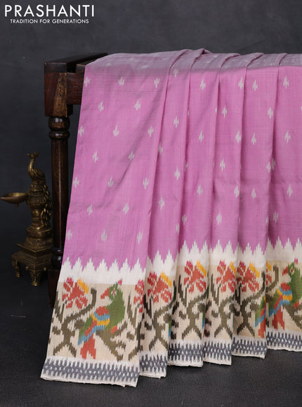 Pochampally silk saree mauve pink and cream with allover ikat woven buttas and temple design ikat zari woven border