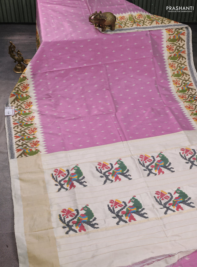 Pochampally silk saree mauve pink and cream with allover ikat woven buttas and temple design ikat zari woven border