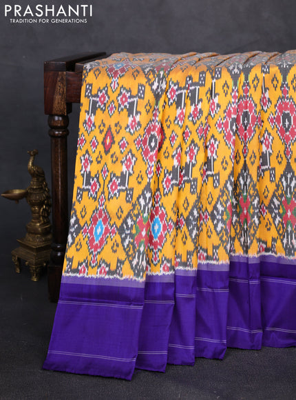 Pochampally silk saree mango yellow and blue with allover ikat weaves and rettapet border