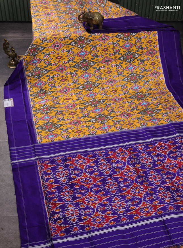 Pochampally silk saree mango yellow and blue with allover ikat weaves and rettapet border