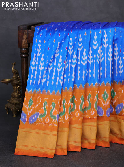 Pochampally silk saree cs blue and orange with allover ikat woven buttas and long ikat zari woven border