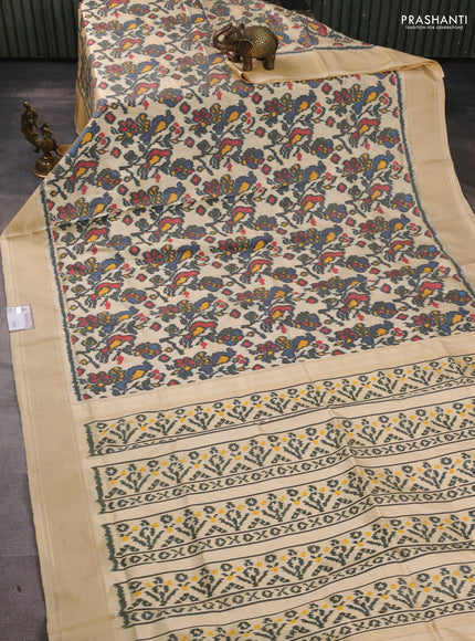Pochampally silk saree black and cream with allover ikat weaves and zari woven border