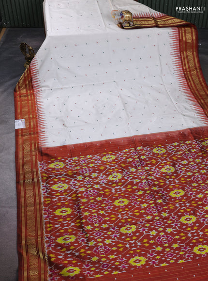 Pochampally silk saree off white and brown with thread woevn buttas and temple design zari woven border
