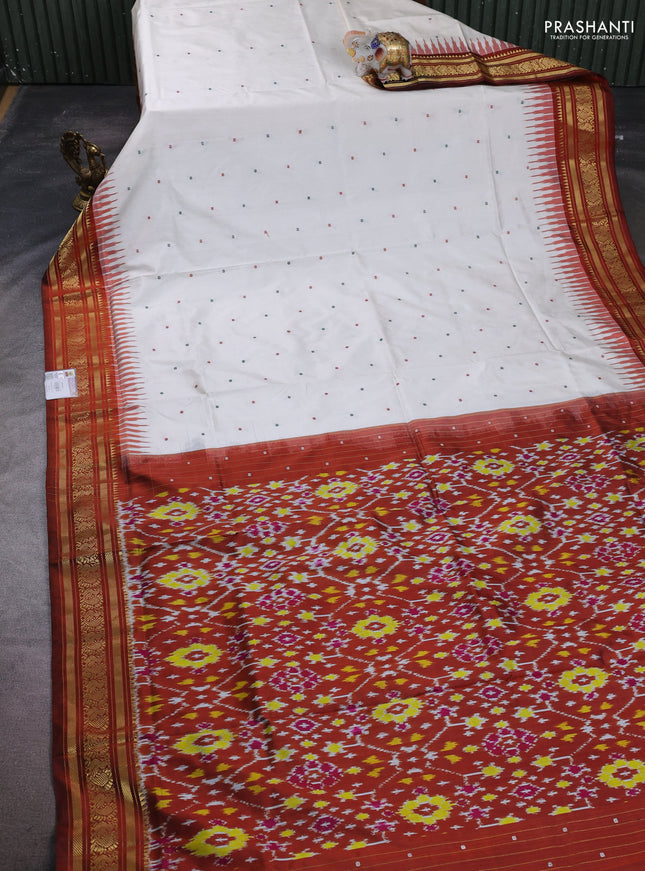 Pochampally silk saree off white and brown with thread woevn buttas and temple design zari woven border