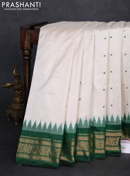 Pochampally silk saree off white and bottle green with allover thread woven buttas and temple design zari woven border