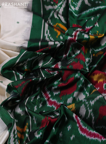 Pochampally silk saree off white and bottle green with allover thread woven buttas and temple design zari woven border
