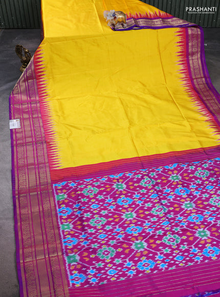 Pochampally silk saree yellow and magenta pink with plain body and temple design zari woven border