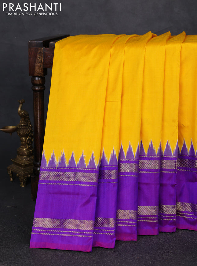 Pochampally silk saree mango yellow and purple with plain body and temple design rettapet zari woven border