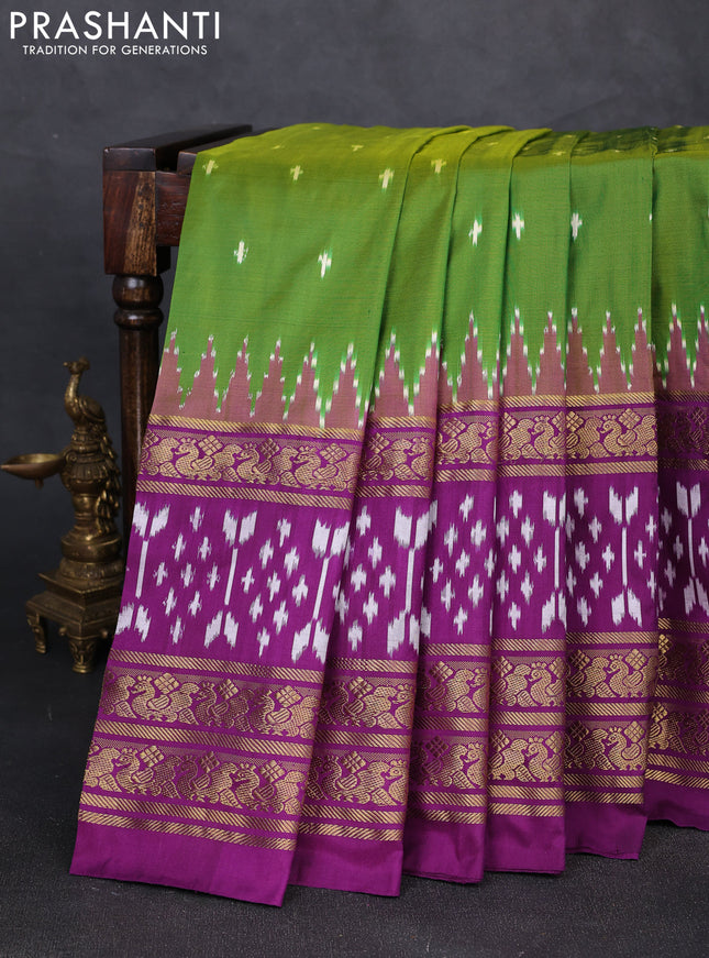 Pochampally silk saree green and purple with allover ikat woven buttas and temple design long zari woven border