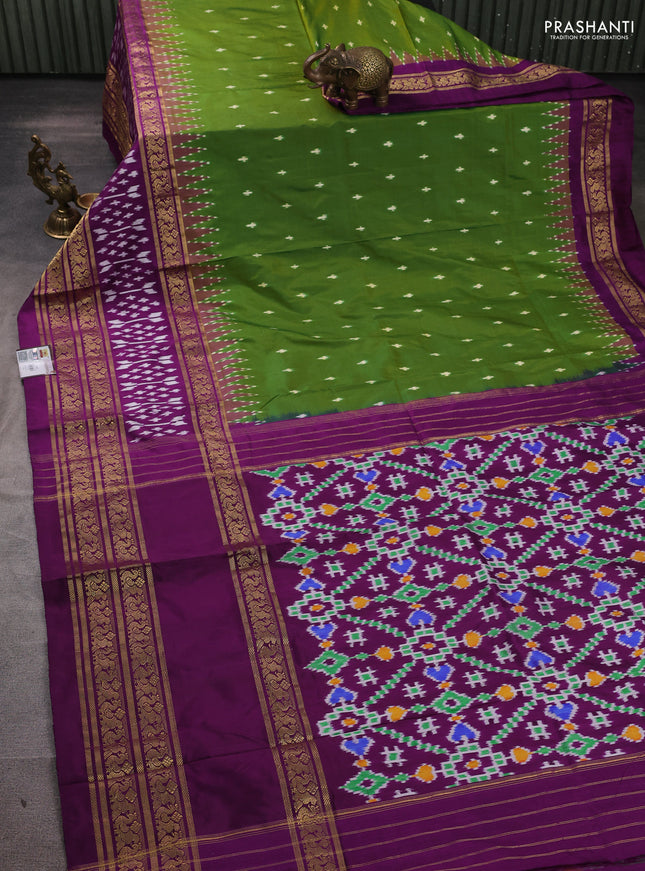 Pochampally silk saree green and purple with allover ikat woven buttas and temple design long zari woven border