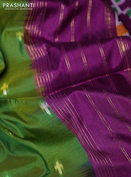 Pochampally silk saree green and purple with allover ikat woven buttas and temple design long zari woven border