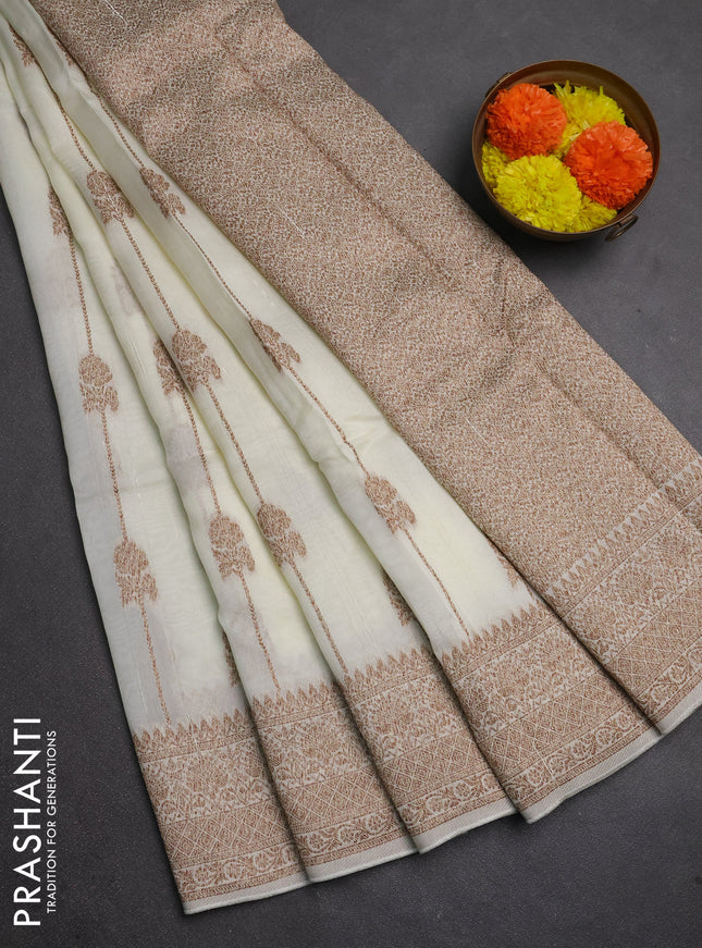 Banarasi semi raw silk saree cream with allover thread & zari weaves and woven border