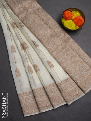 Banarasi semi raw silk saree cream with allover thread & zari weaves and woven border