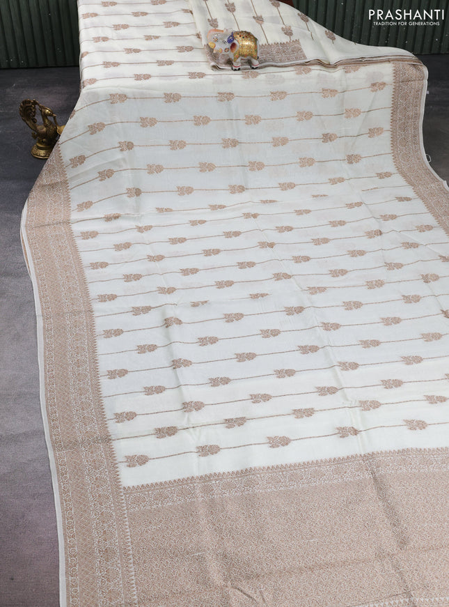 Banarasi semi raw silk saree cream with allover thread & zari weaves and woven border