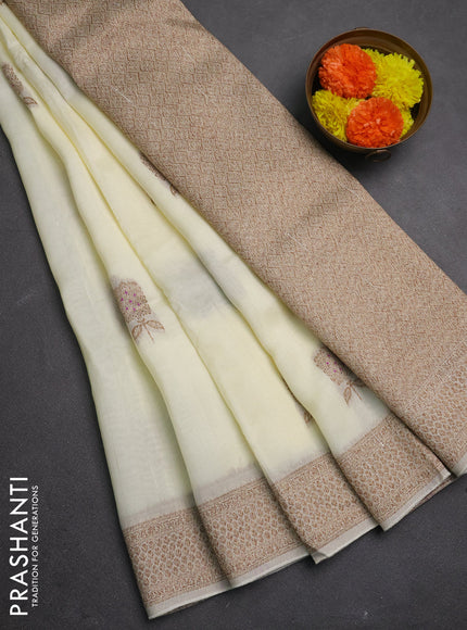 Banarasi semi raw silk saree cream with allover thread & zari woven buttas and woven border