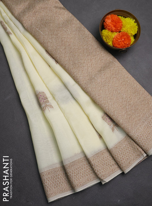 Banarasi semi raw silk saree cream with allover thread & zari woven buttas and woven border