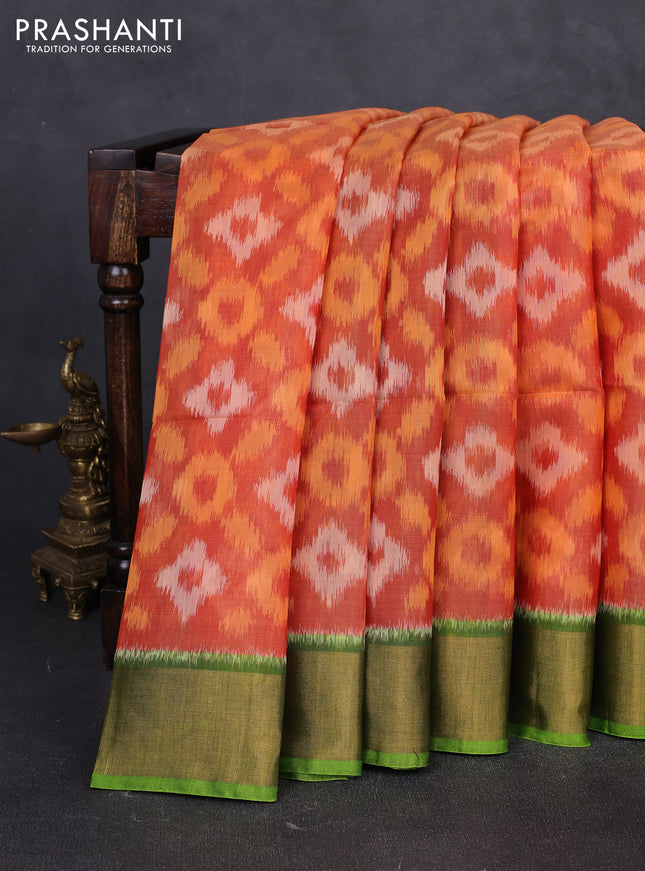 Ikat silk cotton saree orange and light green with allover ikat weaves and zari woven border