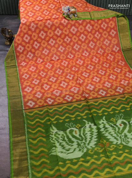 Ikat silk cotton saree orange and light green with allover ikat weaves and zari woven border