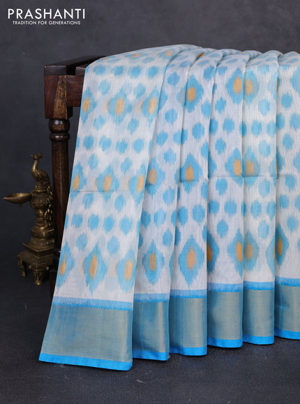 Ikat silk cotton saree off white and cs blue with allover ikat weaves and zari woven border