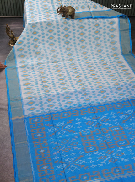 Ikat silk cotton saree off white and cs blue with allover ikat weaves and zari woven border