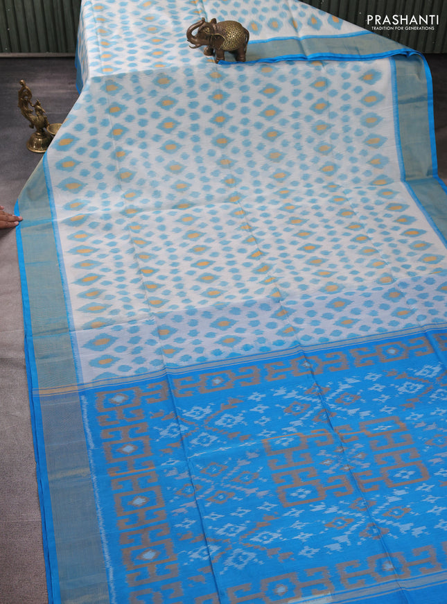 Ikat silk cotton saree off white and cs blue with allover ikat weaves and zari woven border