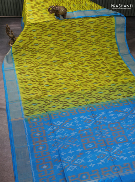 Ikat silk cotton saree fluorescent green and cs blue with allover ikat weaves and zari woven border