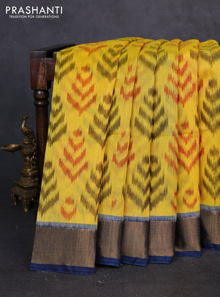 Ikat silk cotton saree yellow and peacock blue with allover ikat weaves and zari woven border