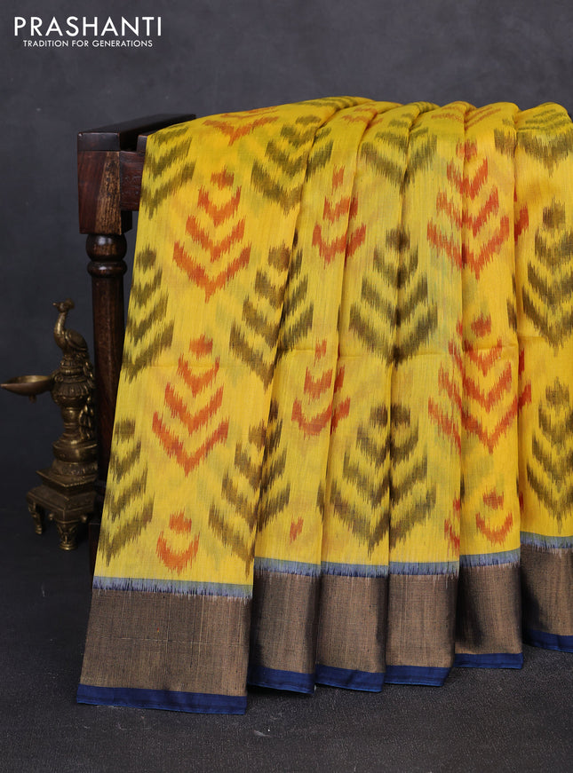 Ikat silk cotton saree yellow and peacock blue with allover ikat weaves and zari woven border