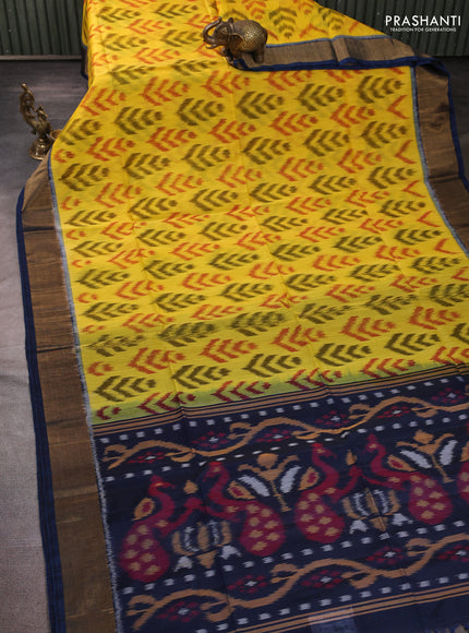 Ikat silk cotton saree yellow and peacock blue with allover ikat weaves and zari woven border