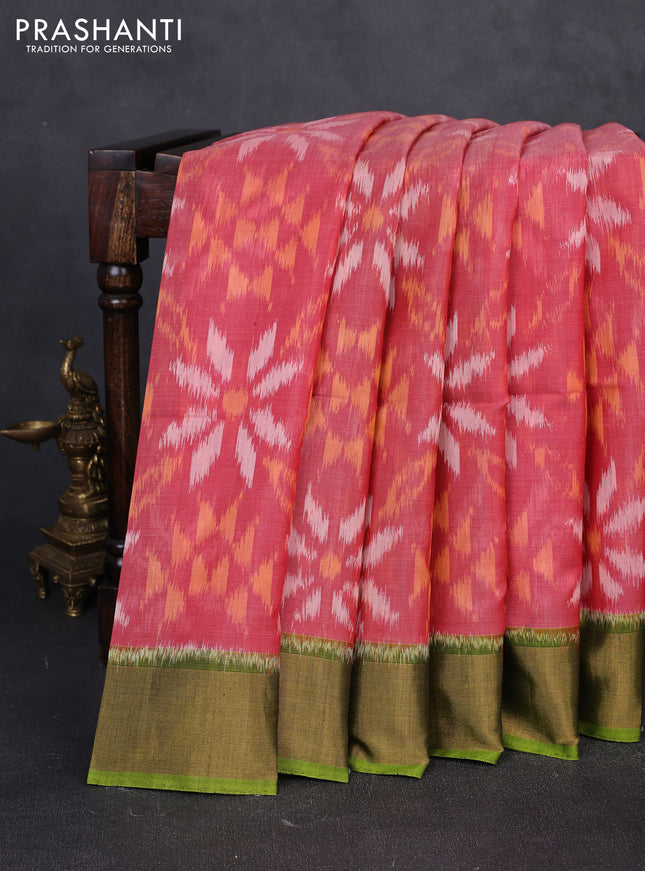 Ikat silk cotton saree red and light green with allover ikat weaves and zari woven border