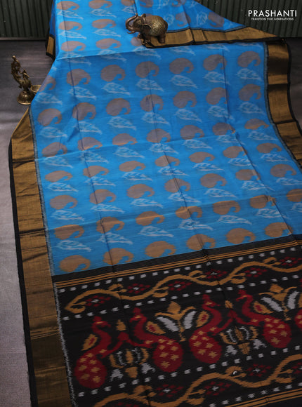 Ikat silk cotton saree cs blue and black with allover ikat weaves and zari woven border