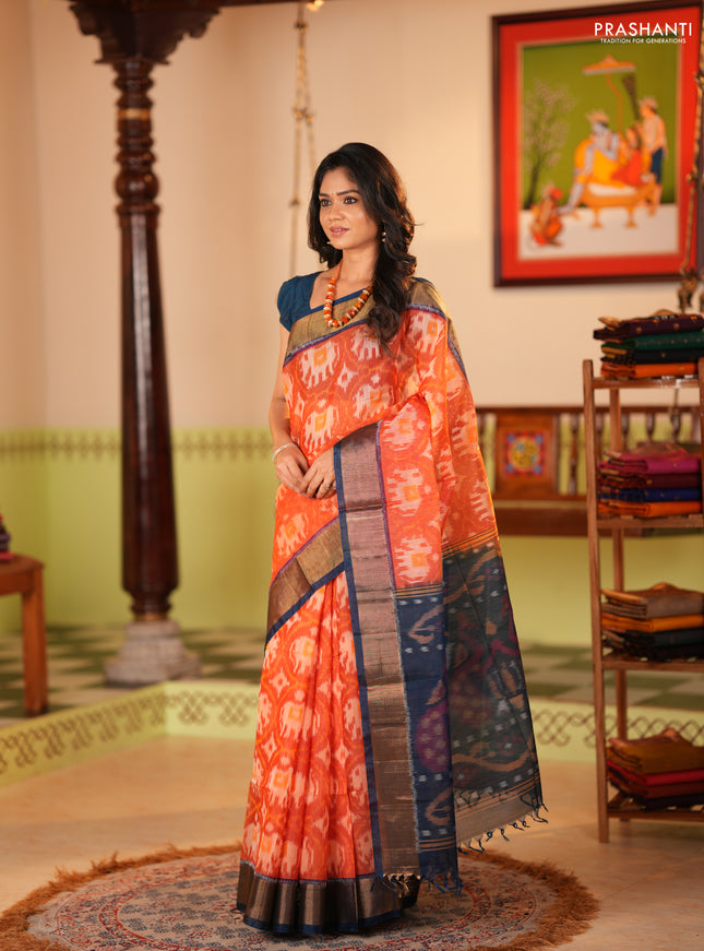 Ikat silk cotton saree orange and peacock blue with allover ikat weaves and zari woven border