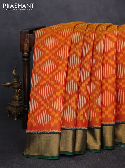 Ikat silk cotton saree orange and bottle green with allover ikat weaves and zari woven border