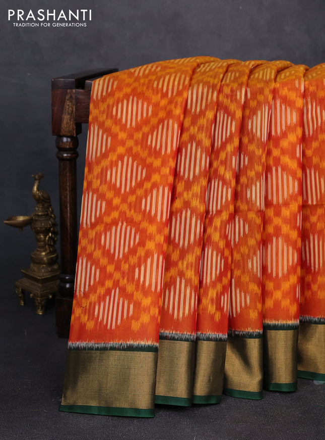 Ikat silk cotton saree orange and bottle green with allover ikat weaves and zari woven border
