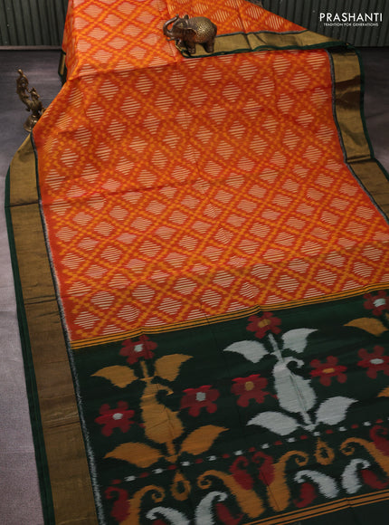 Ikat silk cotton saree orange and bottle green with allover ikat weaves and zari woven border