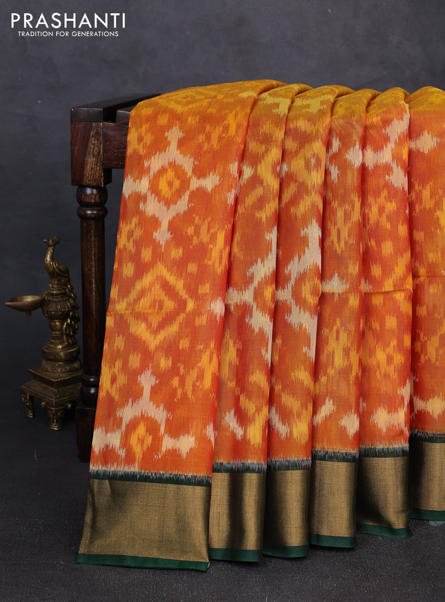 Ikat silk cotton saree orange and bottle green with allover ikat weaves and zari woven border