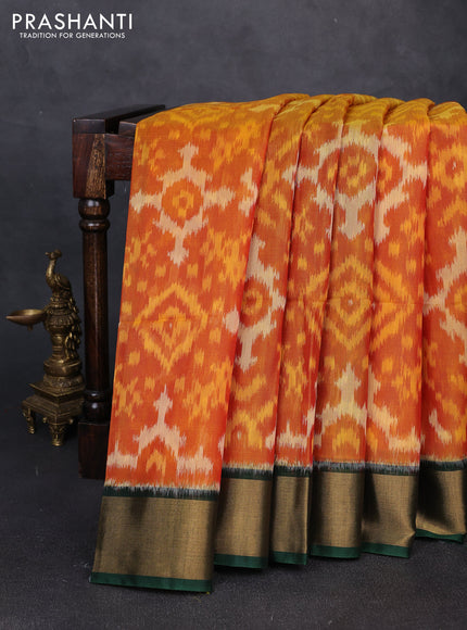 Ikat silk cotton saree orange and bottle green with allover ikat weaves and zari woven border