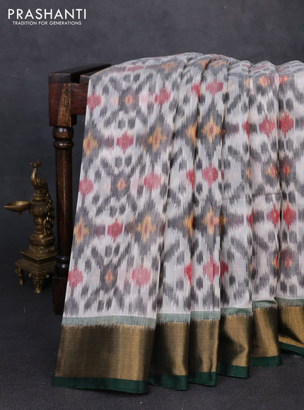 Ikat silk cotton saree grey and bottle green with allover ikat weaves and zari woven border