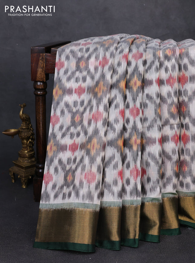 Ikat silk cotton saree grey and bottle green with allover ikat weaves and zari woven border