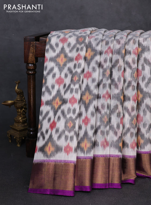 Ikat silk cotton saree off white and purple with allover ikat weaves and zari woven border